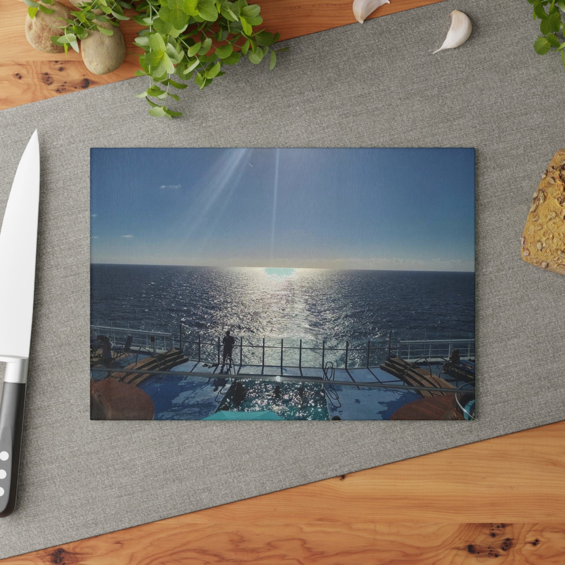 Glass cutting board with Ocean view from the back of a cruise ship